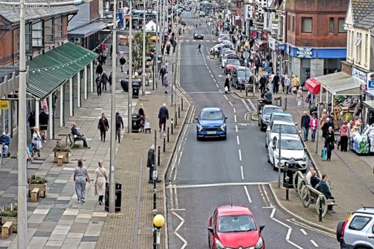 Birdseye view of Cleveleys high street showing a road lined with shops on either side.