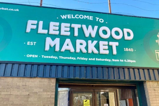 Exterior of Fleetwood Market with a large welcoming Fleetwood Market sign