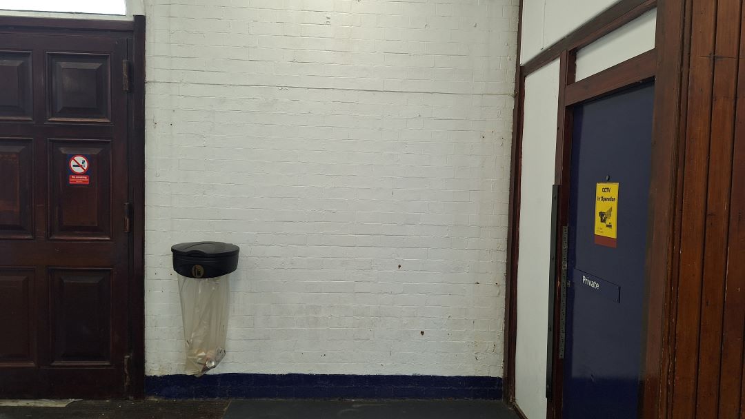 A blank wall space in Poulton station.